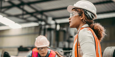 Factory Safety - Workers wearing PPE equipment on industrial site